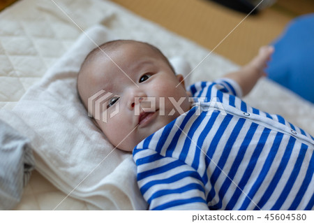 Smiling newborn baby Smiling newborn baby 45604580