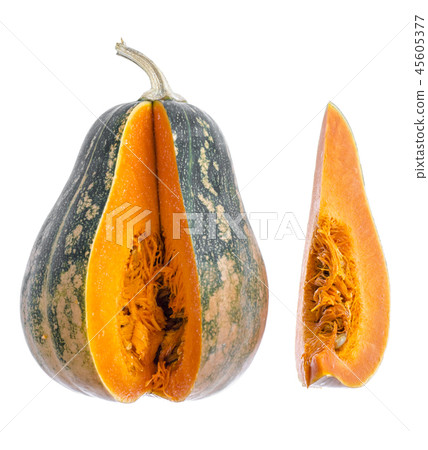 Ripe orange butternut pumpkin on wooden table, ingredients for vegetarian meal Ripe orange butternut pumpkin on wooden table, ingredients for vegetarian meal 45605377