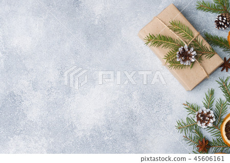 Wrapped gift for Christmas on a gray background Wrapped gift for Christmas on a gray background 45606161