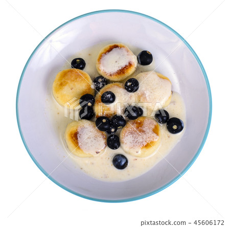Curd products in sweet sauce with berries Curd products in sweet sauce with berries 45606172