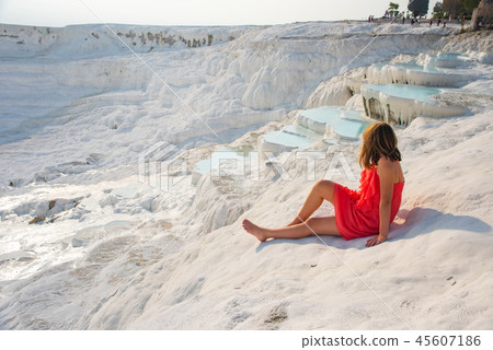 Pamukkale, natural pool with blue water and girl, Turkey Pamukkale, natural pool with blue water and girl, Turkey 45607186