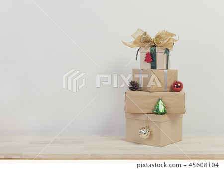 Christmas holiday present on wood table Christmas holiday present on wood table 45608104