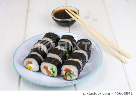 Rolls with salmon, plate on wooden table 45608941