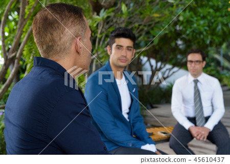 Persian businessmen exploring the city of Bangkok together Persian businessmen exploring the city of Bangkok together 45610437