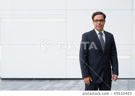 Handsome Persian businessman exploring the city of Bangkok, Thai Handsome Persian businessman exploring the city of Bangkok, Thai 45610485