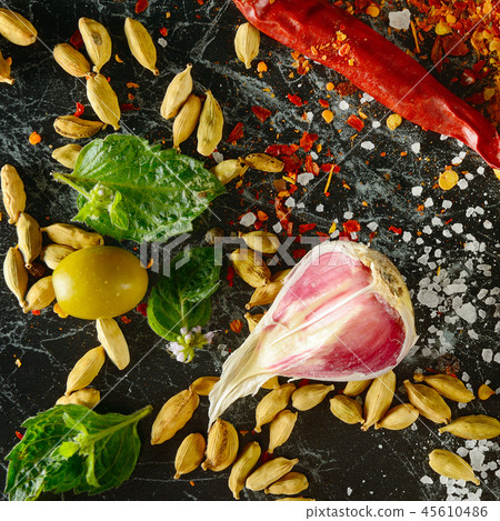 ariety of spices and herb on kitchen table. ariety of spices and herb on kitchen table. 45610486