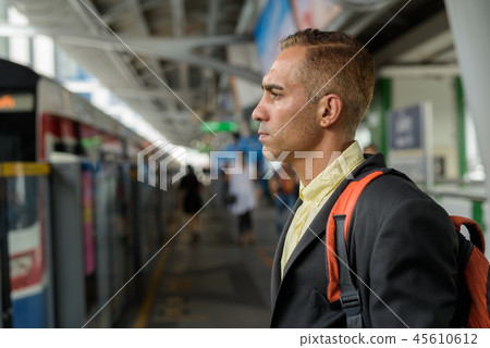 Handsome Persian businessman exploring the city of Bangkok, Thai 45610612