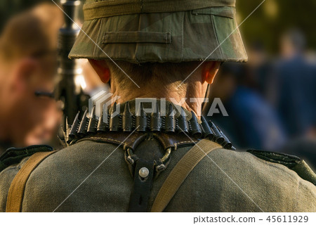 Behind the machine gunner 45611929