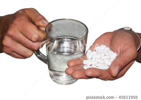 pills and water in hands pills and water in hands 45611950
