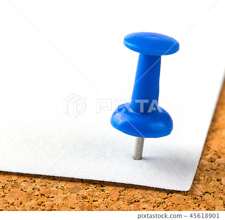 plastic button with a needle stuck in iron sheet plastic button with a needle stuck in iron sheet 45618901