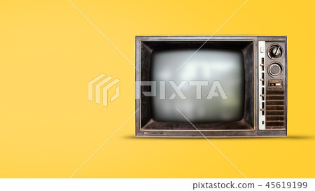 Old vintage tv on yellow background 45619199