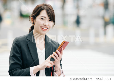 Japanese woman in suit in the city 45619994