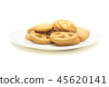one side of butter cookies on plate. 45620141