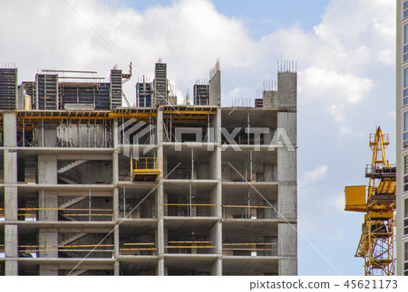 Crane and building under construction  45621173