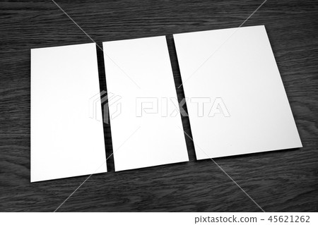 Blank flyer over wooden background Blank flyer over wooden background 45621262