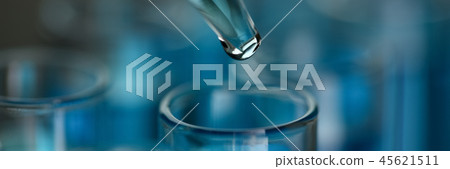 Test tube of glass overflows liquid solution potassium 45621511