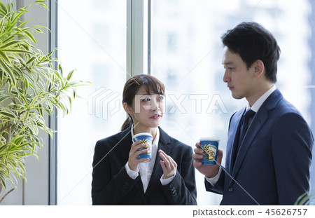 Business man and woman coffee break 45626757