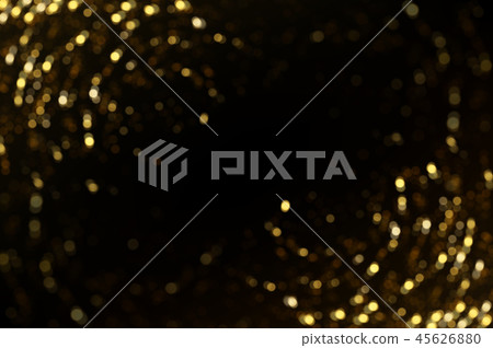 Sparkling golden particles 45626880