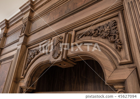 Part of the cupboard with handmade wood carving Part of the cupboard with handmade wood carving 45627094