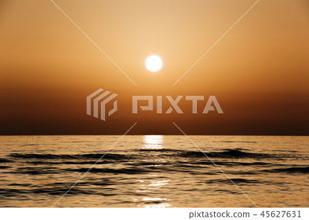 orange sunset over the sea orange sunset over the sea 45627631