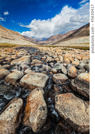 Mountain stream with stones in Himalayas 45630417