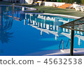 Reflection of duplex complex apartments on pool 45632538