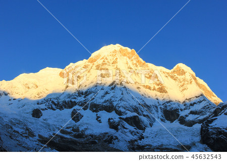 Sunlight on the peak of Annapurna Mountain Range 45632543