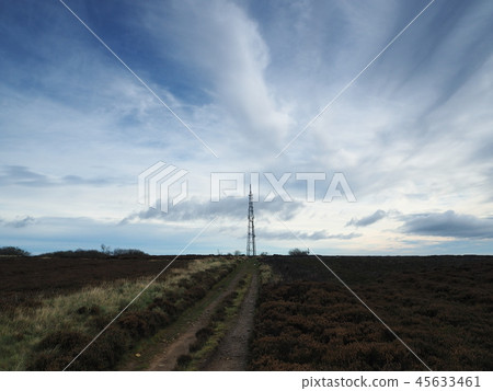 Transmitter mast on moors under brooding sky Transmitter mast on moors under brooding sky 45633461