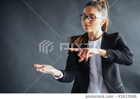 woman showing open hand palm with copy space for product or text woman showing open hand palm with copy space for product or text 45633986