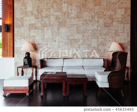 Resort style couch, wood table with fabric cushion Resort style couch, wood table with fabric cushion 45635493