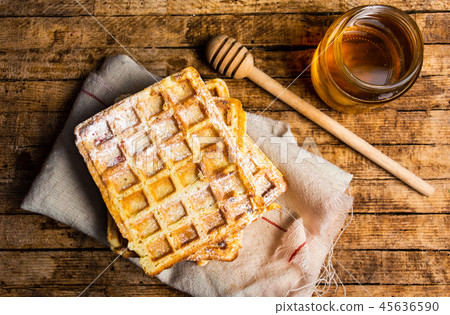 Homemade waffles with honey jar 45636590