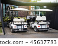 Golf cars parking at the hotel for clients service 45637783