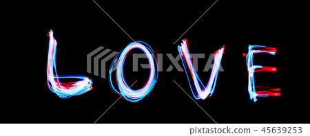 Glowing inscription LOVE on a black background Glowing inscription LOVE on a black background 45639253