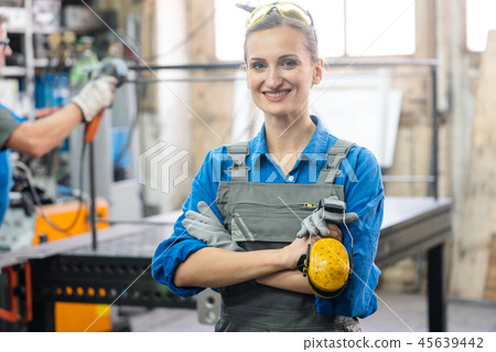 Workers in a metal workshop  45639442