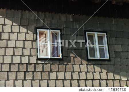 white window in the old wooden house. 45639788