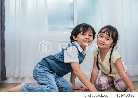 Two caucasions brother and sister portrait. Children and kids co Two caucasions brother and sister portrait. Children and kids co 45640056