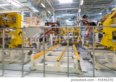 process of welding cars. Modern Assembly of cars at plant. automated build process of car body 45640256