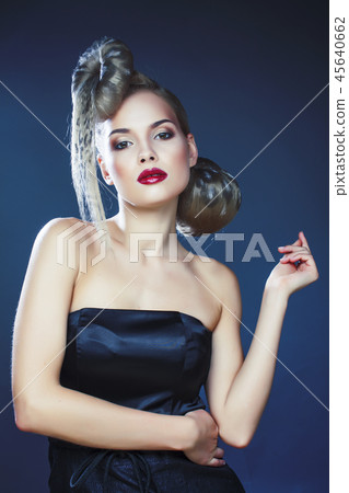 young elegant woman with creative hair style leopard print close young elegant woman with creative hair style leopard print close 45640662