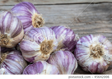 Garlic on wooden vintage background.  45642006