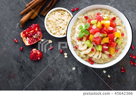 Oatmeal with fresh fruits and almond Oatmeal with fresh fruits and almond 45642366