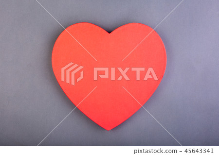 Red heart on the gray background. Holiday background, Valentine's day Red heart on the gray background. Holiday background, Valentine's day 45643341