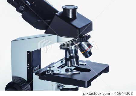Close up of microscope at the laboratory. Close up of microscope at the laboratory. 45644308