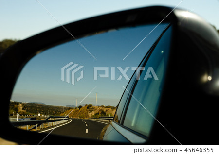 view in the car mirror on fast road in the Spain view in the car mirror on fast road in the Spain 45646355