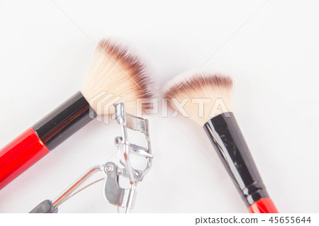 Set of decorative cosmetics on light colorful back Set of decorative cosmetics on light colorful back 45655644