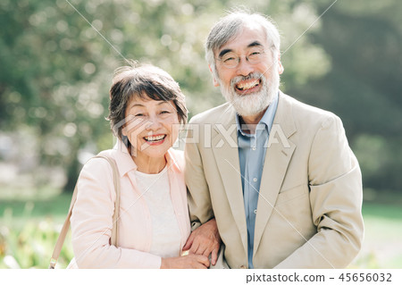 Cuddling Japanese senior couple park outdoors Cuddling Japanese senior couple park outdoors 45656032