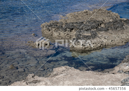 clear water of Mediterranean with stone and sandy bottom clear water of Mediterranean with stone and sandy bottom 45657356