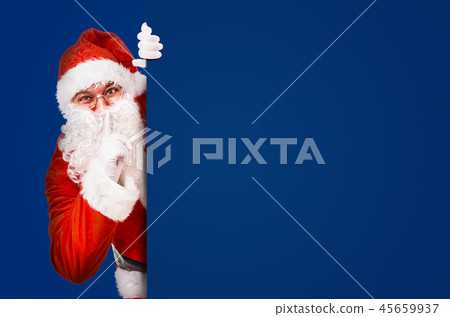 Santa Claus asking for silence 45659937