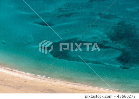 view of deserted beach from the mirador del rio 45660272