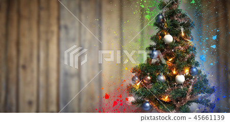 Xmass ball ornement tree against wooden wall Xmass ball ornement tree against wooden wall 45661139
