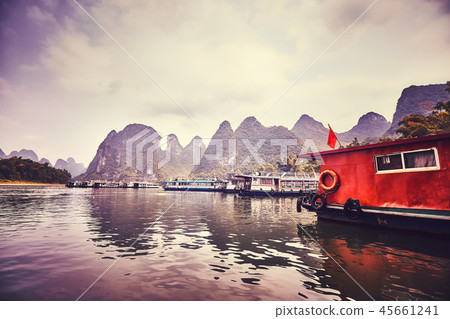 Boats moored at the Lijiang River bank in Xingping 45661241